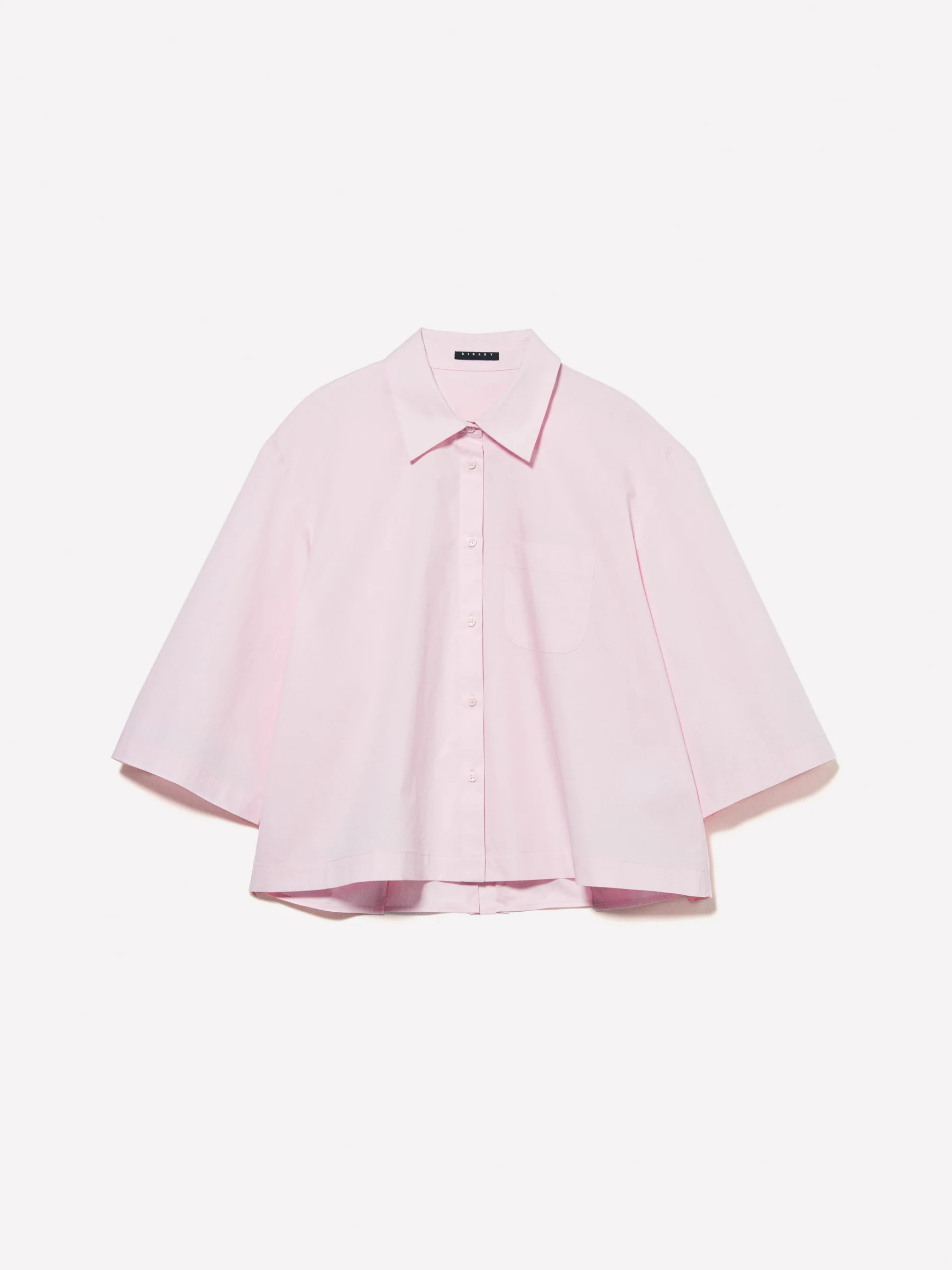 Camicia cropped rosa con pieghe