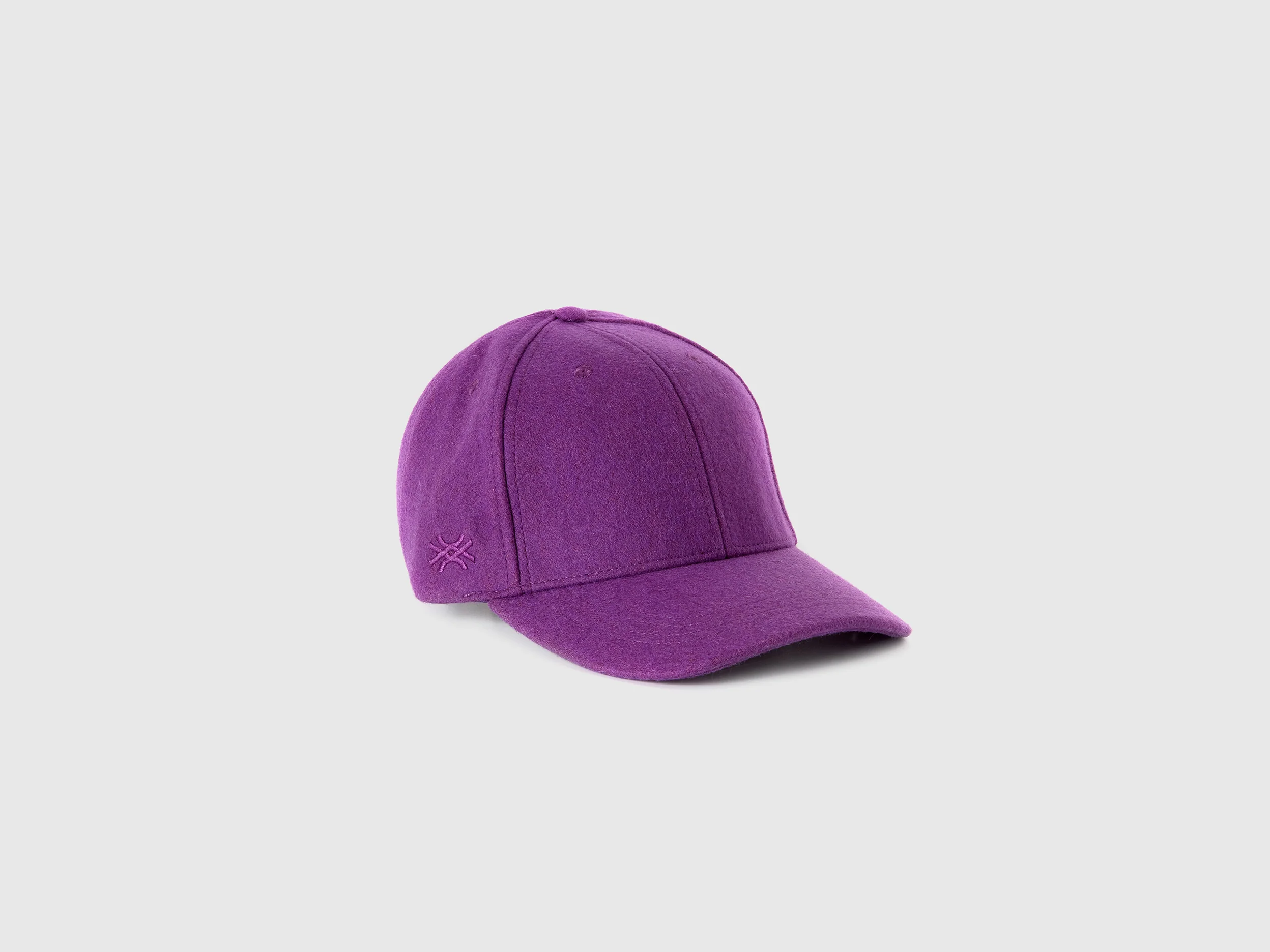 Cappello con visiera in panno