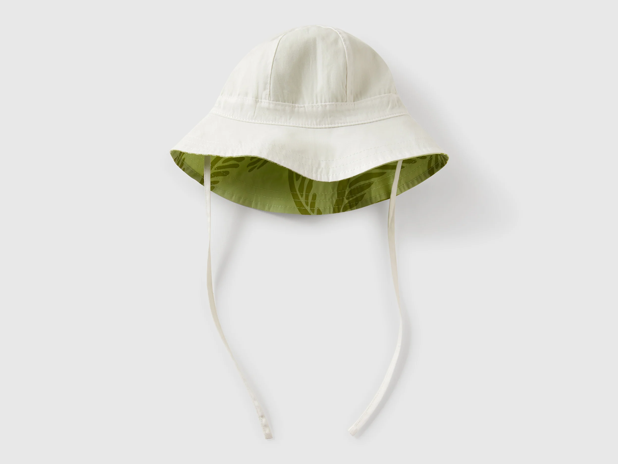 Cappello reversibile con stampa tropicale