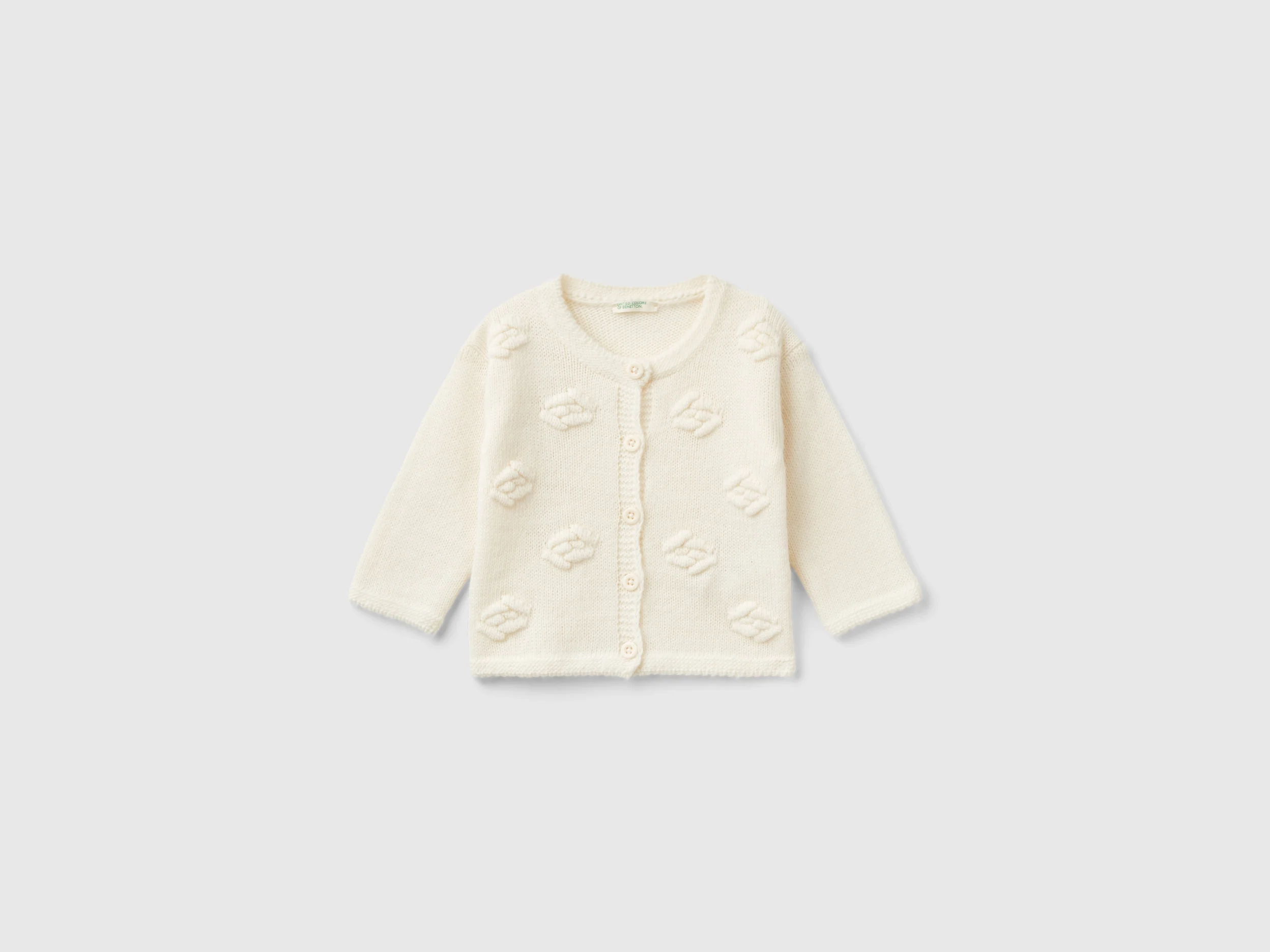 Cardigan con rose in misto lana