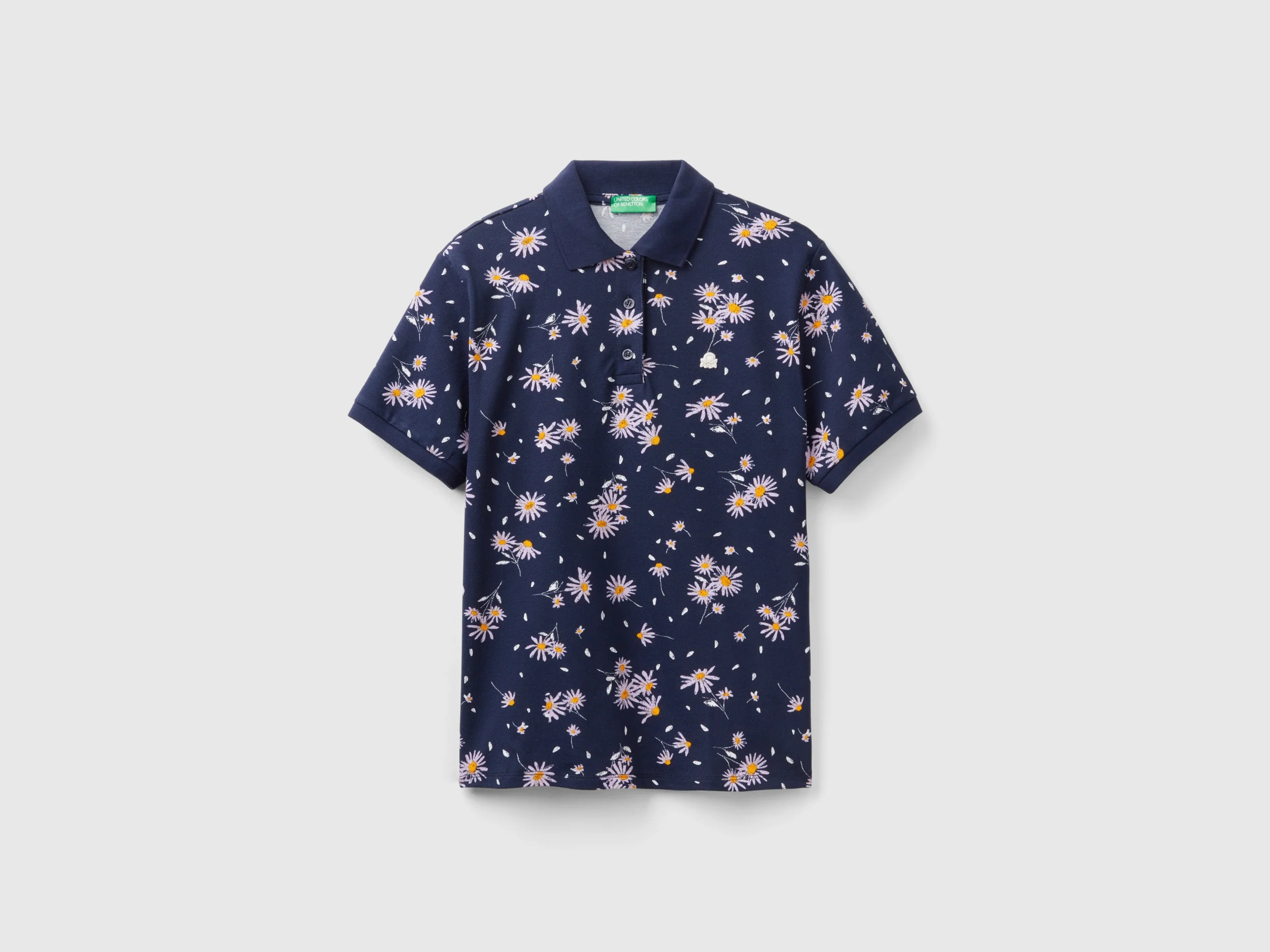 Polo con stampa margherite