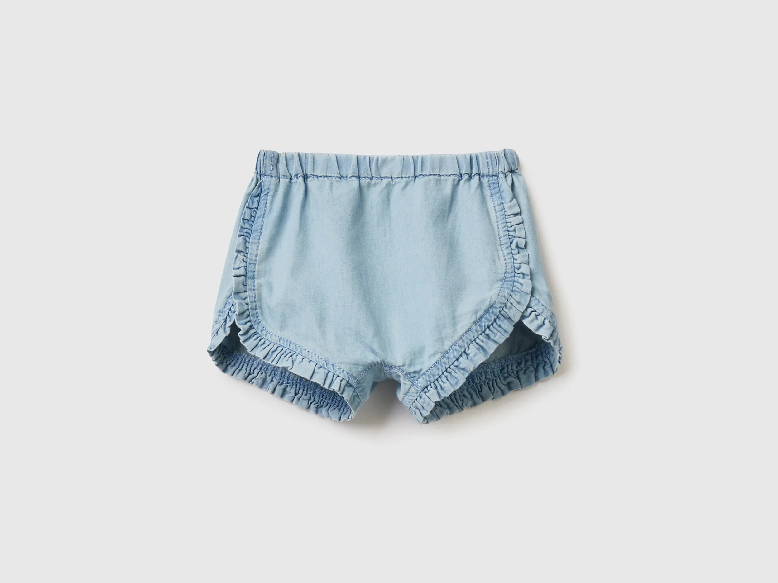 Shorts con rouches