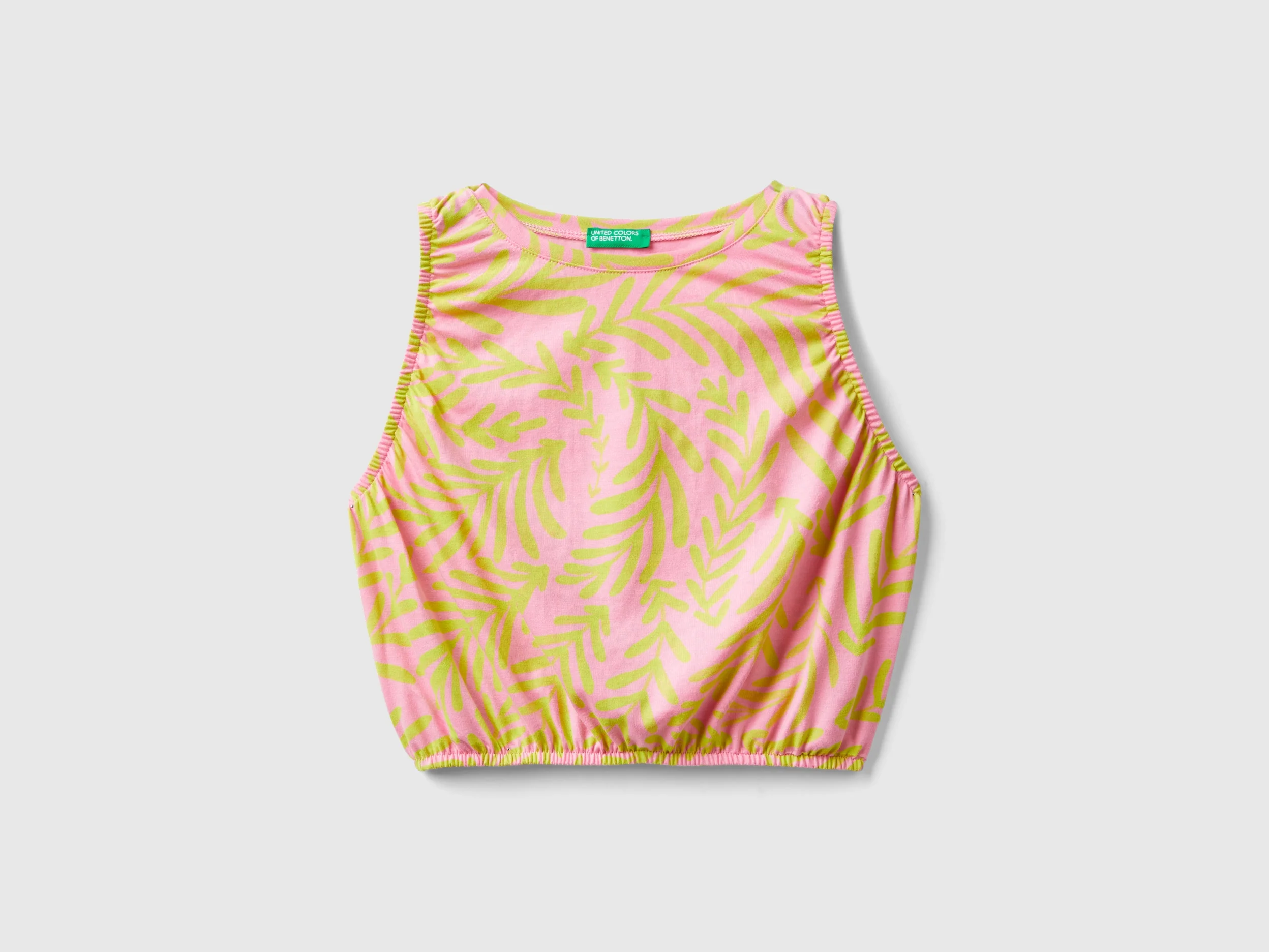Top rosa chiaro con stampa tropicale